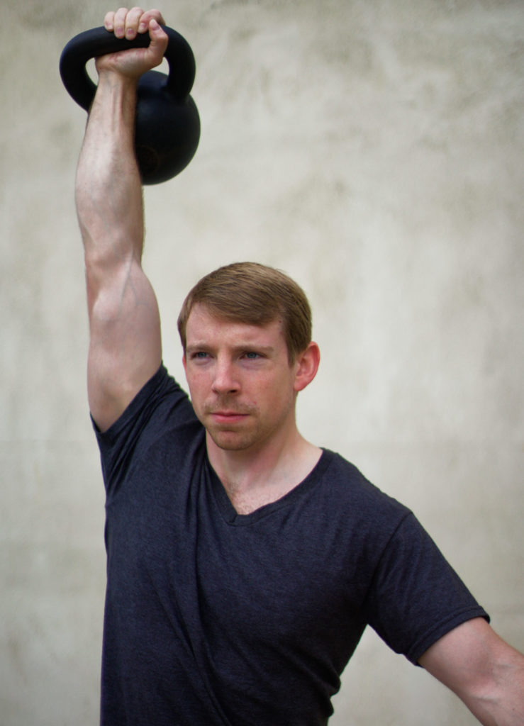 The kettlebell snatch with proper form.